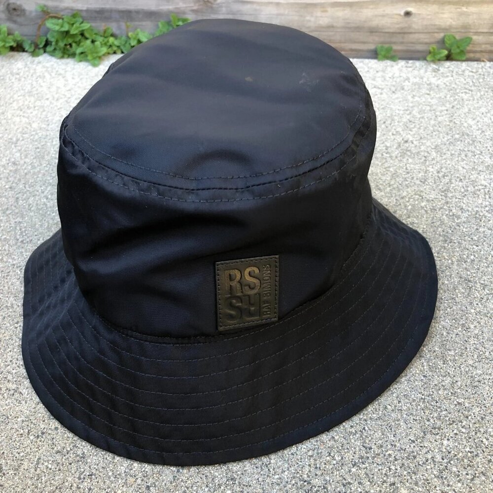 RAF SIMONS Spring-Summer 2023 Nylon Bucket Hat Unisex Black Italy Cap Designer​